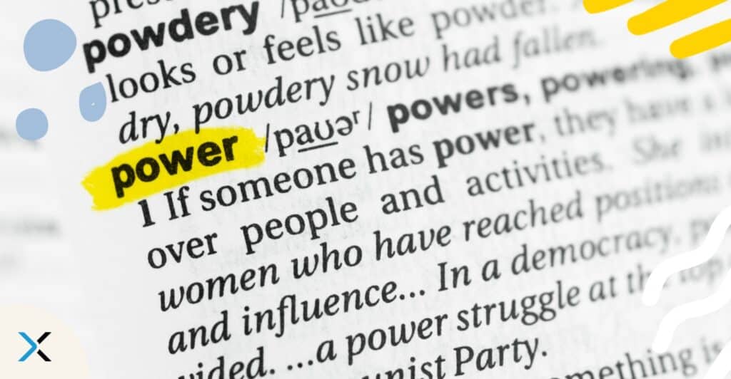 An open dictionary with the word "power" highlighted to symbolize why hiring a terminologist matters.