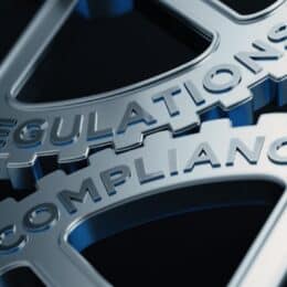 Two gears, labeled with "Regulations" and "Compliance" symbolize pharma content compliance.