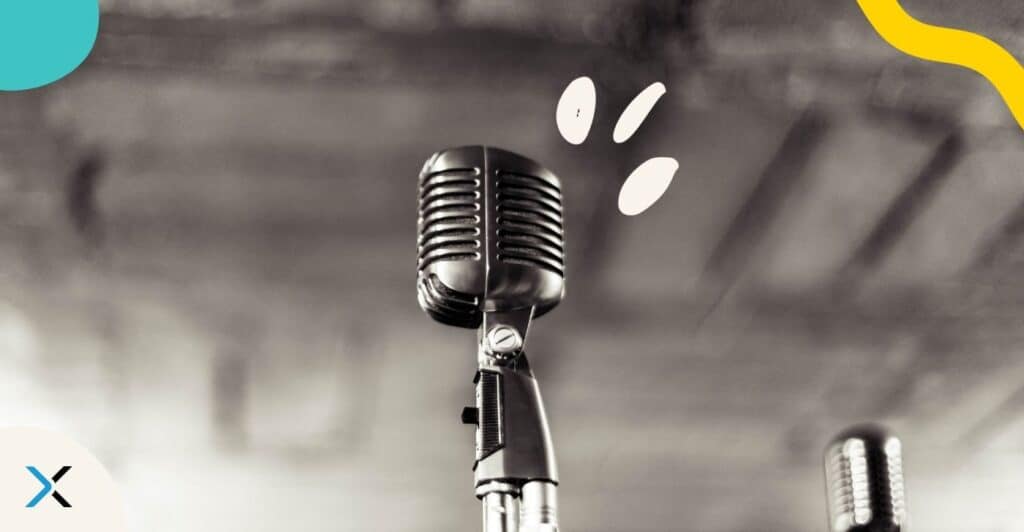 To illustrate a blog about passive vs. active voice, an image of a microphone stands for active voice.