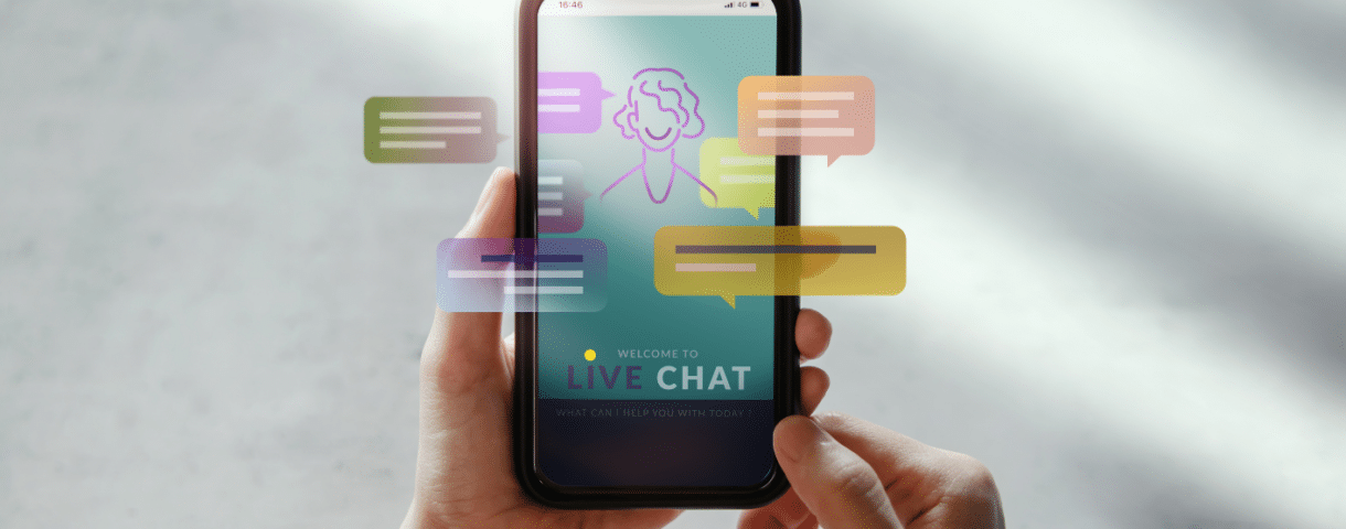 On a grey background is a mobile phone with different colored speech bubbles and a cartoon of a person to symbolize self-service content and its ability to reduce customer support calls.