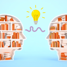 Two head shaped bookcases with a light bulb between them disuccins how to build a knowledge transfer plan with better content