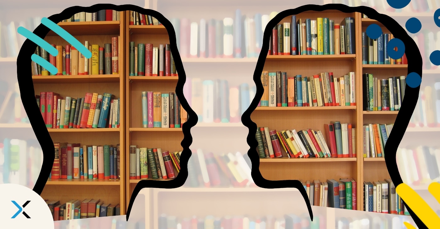 The silhouettes of two people talking to each other are depicted in front of a bookshelf; this symbolizes translation management with a translation management system.